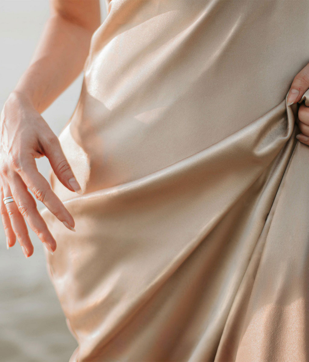 Stock image of dress showing stains removed by frequency separation
