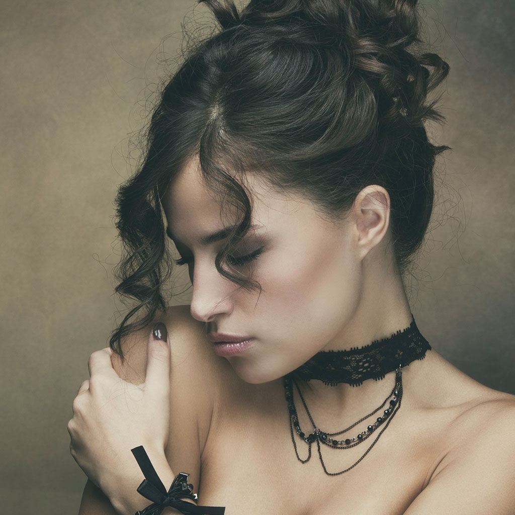 Stock portrait of woman with fly-away hair